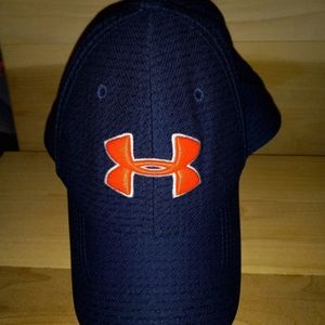 Dark blue under armor baseball cap with orange logo